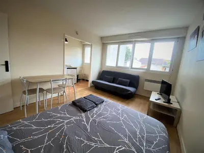 Un ou plusieurs lits dans un hébergement de l'établissement Appartement double à Limoges