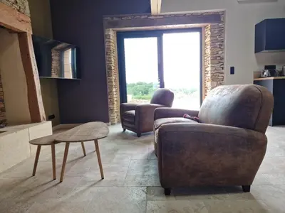 Coin salon dans l'établissement La Maison du Peuch