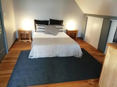 Un ou plusieurs lits dans un hébergement de l'établissement Le Mont Gapier - La Bergerie - Vacances reposantes dans une authentique ferme - II