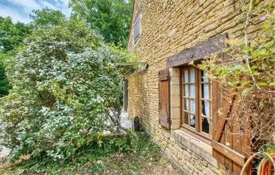 Jardin de l'établissement Charmante Maison Avec Piscine