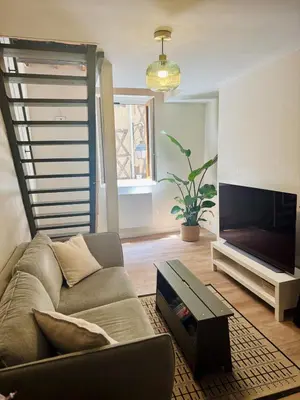 Coin salon dans l'établissement Élégant duplex dans le centre historique