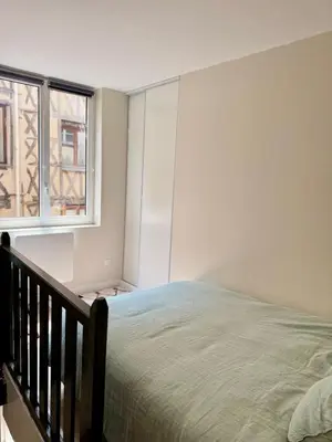 Un ou plusieurs lits dans un hébergement de l'établissement Élégant duplex dans le centre historique