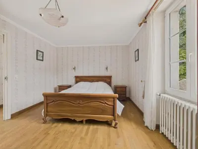 Un ou plusieurs lits dans un hébergement de l'établissement Face a la Vézère - Maison pour 6 - Terrasse