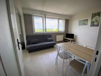 Coin salon dans l'établissement Appartement double à Limoges