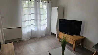Télévision ou salle de divertissement dans l'établissement Le gîte le ladignacois