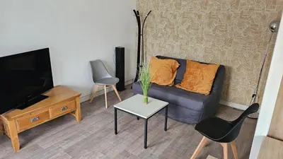 Télévision ou salle de divertissement dans l'établissement Le gîte le ladignacois