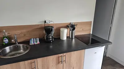 Cuisine ou kitchenette dans l'établissement Le gîte le ladignacois