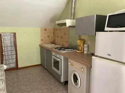 Cuisine ou kitchenette dans l'établissement Gîte de la Saladie