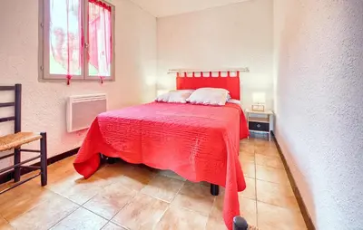 Un ou plusieurs lits dans un hébergement de l'établissement Charmante Maison À La Campagne