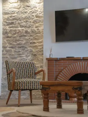 Télévision ou salle de divertissement dans l'établissement Les chambres de la Marquise