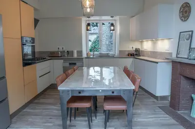 Cuisine ou kitchenette dans l'établissement Les chambres de la Marquise