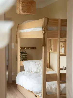 Un ou plusieurs lits dans un hébergement de l'établissement Les chambres de la Marquise