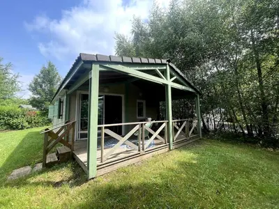 Jardin de l'établissement Chalet Cosy 7 pers Nature avec Piscine