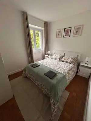 Un ou plusieurs lits dans un hébergement de l'établissement Petite maison au pied du château