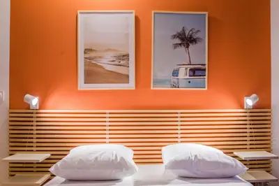 Un ou plusieurs lits dans un hébergement de l'établissement L'Indigo - 1 Chambre