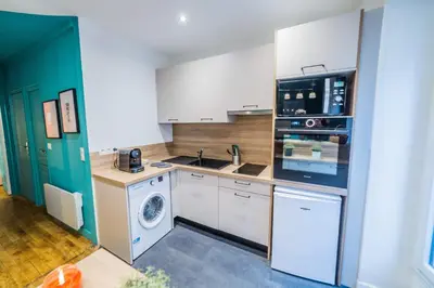 Cuisine ou kitchenette dans l'établissement L'Indigo - 1 Chambre