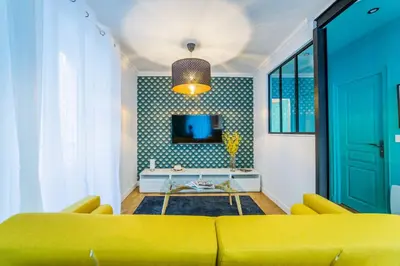 Télévision ou salle de divertissement dans l'établissement L'Indigo - 1 Chambre