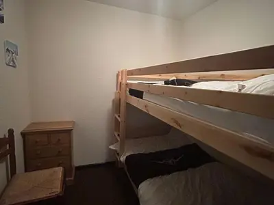 Un ou plusieurs lits dans un hébergement de l'établissement Appartement confort pour 4/6 pers. au cœur de la station avec terrasse - FR-1-814-140