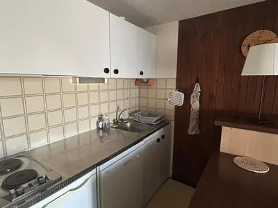 Cuisine ou kitchenette dans l'établissement Appartement confort pour 4/6 pers. au cœur de la station avec terrasse - FR-1-814-140