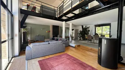 Coin salon dans l'établissement Maison en Pierre - piscine - jacuzzi