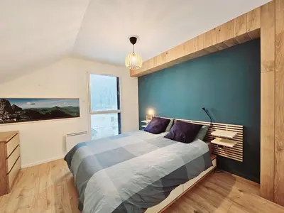 Un ou plusieurs lits dans un hébergement de l'établissement MAGNIFIQUE APPARTEMENT DUPLEX - 13 personnes