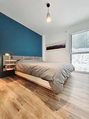 Un ou plusieurs lits dans un hébergement de l'établissement MAGNIFIQUE APPARTEMENT DUPLEX - 13 personnes