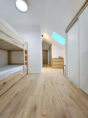 Un ou plusieurs lits dans un hébergement de l'établissement MAGNIFIQUE APPARTEMENT DUPLEX - 13 personnes