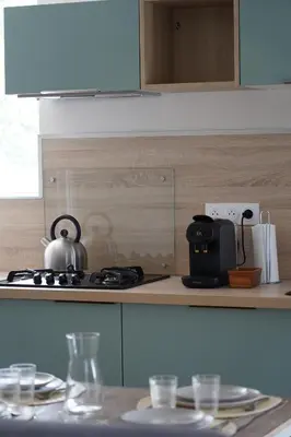 Cuisine ou kitchenette dans l'établissement Le Balcon d'Auxane - Entre ciel, lac et montagne