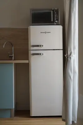 Cuisine ou kitchenette dans l'établissement Le Balcon d'Auxane - Entre ciel, lac et montagne