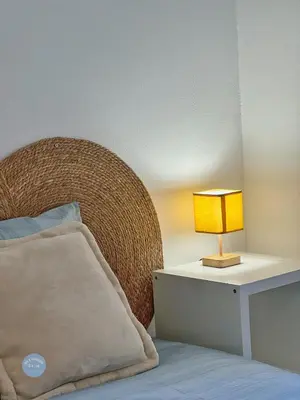 Un ou plusieurs lits dans un hébergement de l'établissement Les Glycines - Maison familiale avec jardin, entre nature et confort