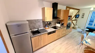 Cuisine ou kitchenette dans l'établissement Le Capucine Le Mont-Dore