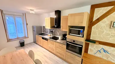 Cuisine ou kitchenette dans l'établissement Le Capucine Le Mont-Dore