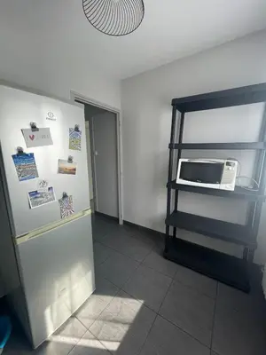 Un ou plusieurs lits dans un hébergement de l'établissement Appartement à 2 pas du centre, 2 chambres, 4 a 6 personnes, parking