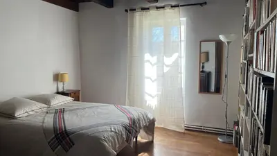 Un ou plusieurs lits dans un hébergement de l'établissement Maison 10 Personnes Quercy
