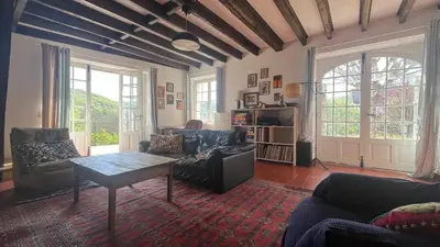 Coin salon dans l'établissement Maison 10 Personnes Quercy