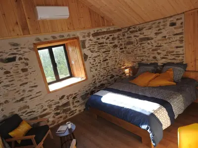 Un ou plusieurs lits dans un hébergement de l'établissement Les secrets de la nature chambre d'hôtes, tentes luxe et nature
