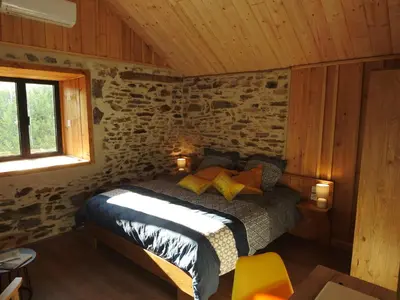 Un ou plusieurs lits dans un hébergement de l'établissement Les secrets de la nature chambre d'hôtes, tentes luxe et nature