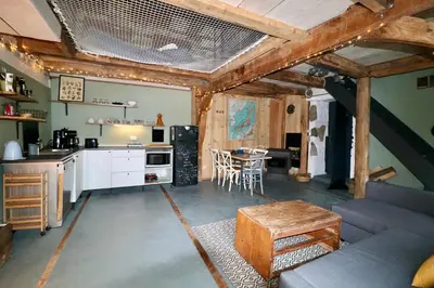Cuisine ou kitchenette dans l'établissement La grange de Louise