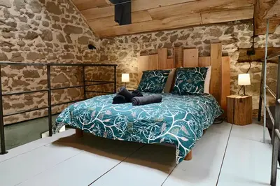 Un ou plusieurs lits dans un hébergement de l'établissement La grange de Louise