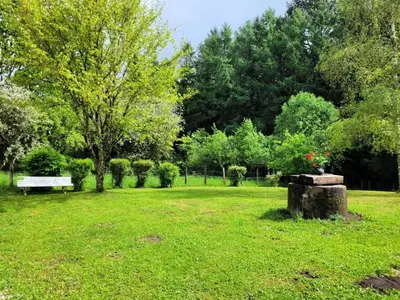 Jardin de l'établissement Gîte de France Chez baptiste 2 épis - Gîte de France 4 personnes MAE-0013