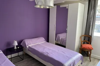 Un ou plusieurs lits dans un hébergement de l'établissement Gîte les hortensias