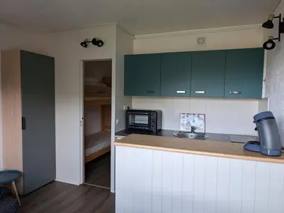Cuisine ou kitchenette dans l'établissement Studio cabine rénové avec vue sur le centre, WiFi et animaux acceptés - FR-1-787-117