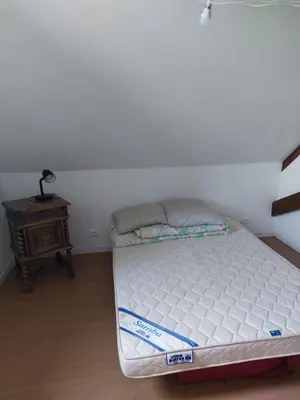 Un ou plusieurs lits dans un hébergement de l'établissement Maison à la campagne