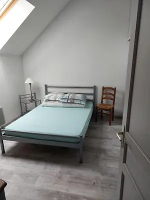 Un ou plusieurs lits dans un hébergement de l'établissement Maison à la campagne