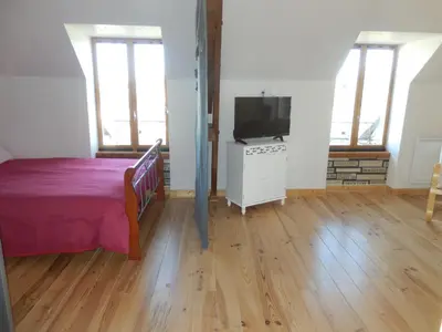 Un ou plusieurs lits dans un hébergement de l'établissement La Maison en Cézallier - London Eyes