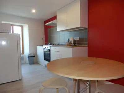 Cuisine ou kitchenette dans l'établissement La Maison en Cézallier - London Eyes