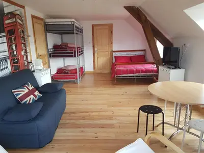 Coin salon dans l'établissement La Maison en Cézallier - London Eyes