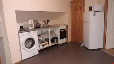 Cuisine ou kitchenette dans l'établissement La Maison en Cézallier - Roses