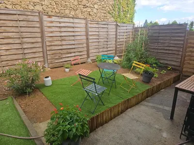 Jardin de l'établissement Maison cocon proche gare et centre ville
