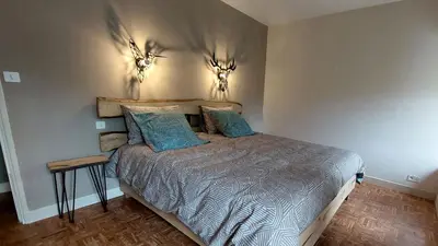 Un ou plusieurs lits dans un hébergement de l'établissement NESST - Gîte Horse & Dog Friendly Cottage
